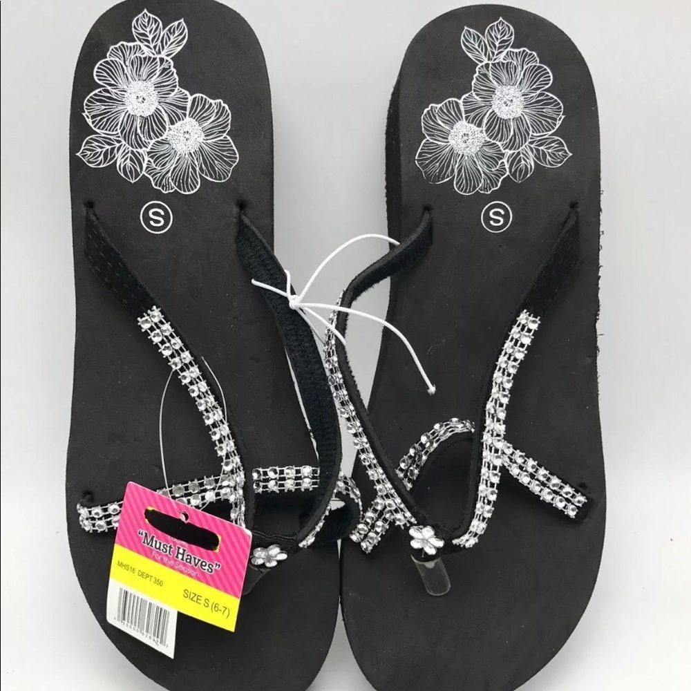 Women’s wedge foam sandal with accents